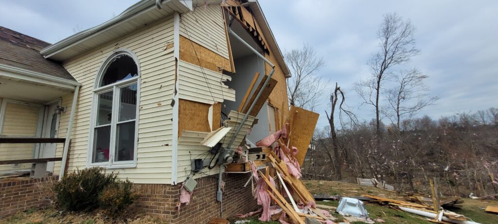 Storm damage restoration in Clarksville TN with exterior home repair and rebuild preparation