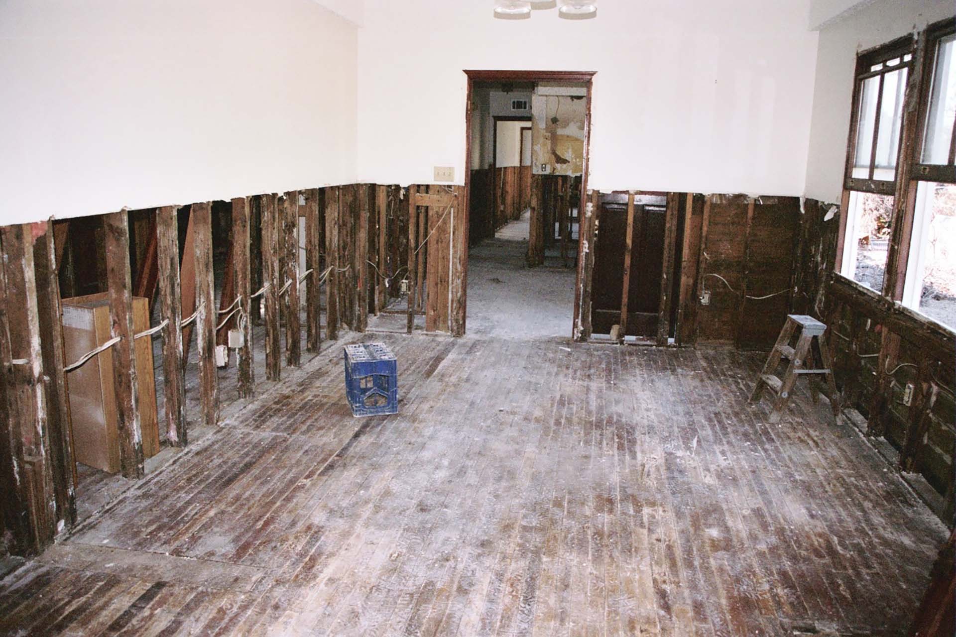 Water damage restoration in Clarksville TN with exposed framing and interior repair preparation